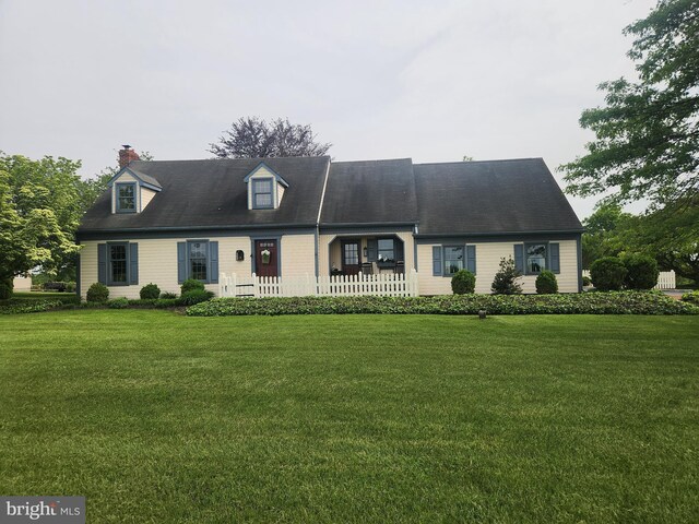 2569 White Oak Rd, Strasburg, PA 17579 - new england style home featuring a front yard and a chimney