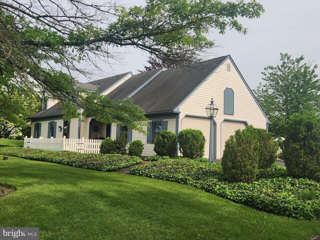 2569 White Oak Rd, Strasburg, PA 17579 - view of side of home with a garage and a shingled roof