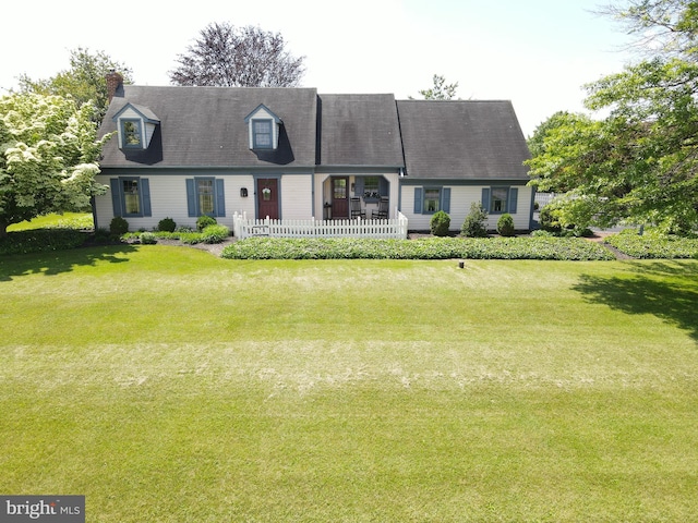 2569 White Oak Rd, Strasburg, PA 17579 - cape cod-style house featuring a front lawn and a chimney