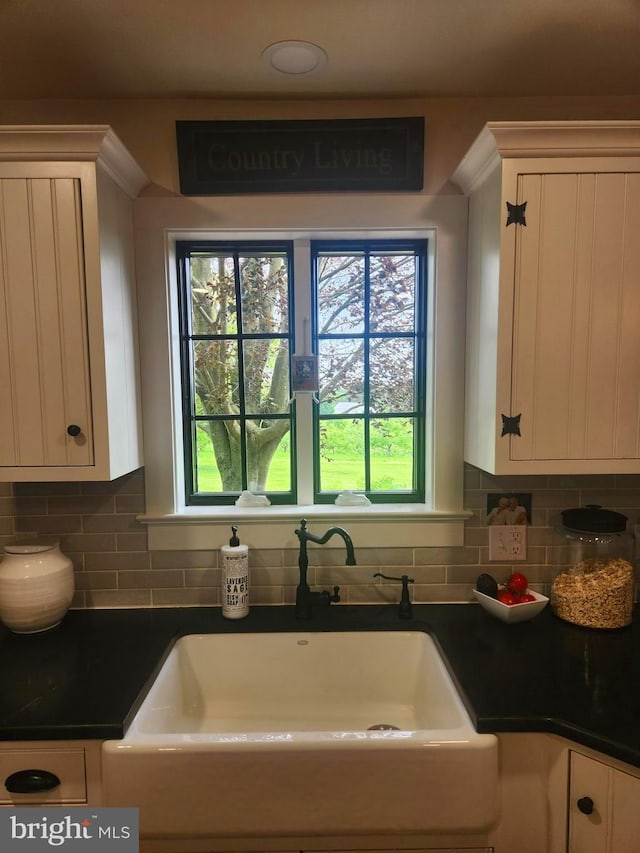 2569 White Oak Rd, Strasburg, PA 17579 - kitchen featuring white cabinetry, dark countertops, and plenty of natural light