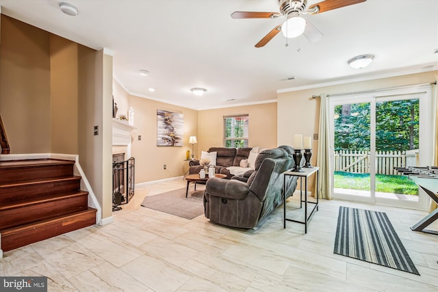 14329 Long Channel Dr, Germantown, MD 20874 - living room featuring crown molding, stairway, and ceiling fan