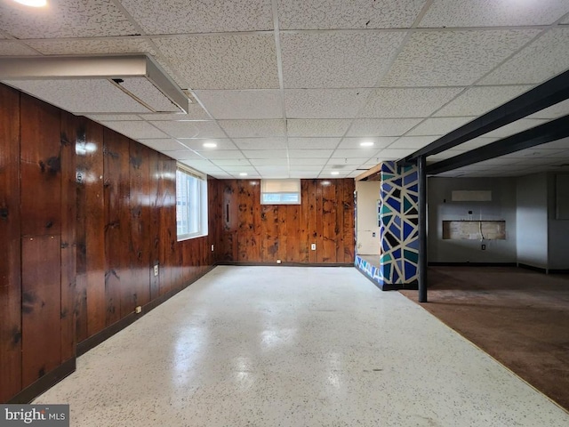 6222 Catalpha Rd, Baltimore, MD 21214 - basement featuring wood walls and a paneled ceiling