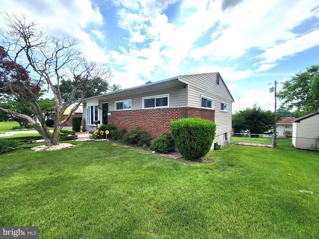 6222 Catalpha Rd, Baltimore, MD 21214 - view of front of home with brick siding