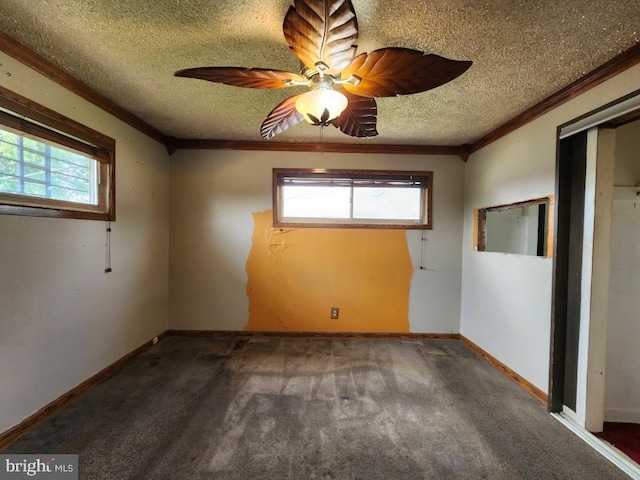 6222 Catalpha Rd, Baltimore, MD 21214 - carpeted empty room with crown molding and a textured ceiling
