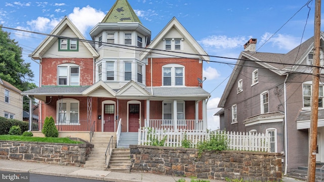 501 W 4th St, Bethlehem, PA 18015 - view of front of house with covered porch and brick siding