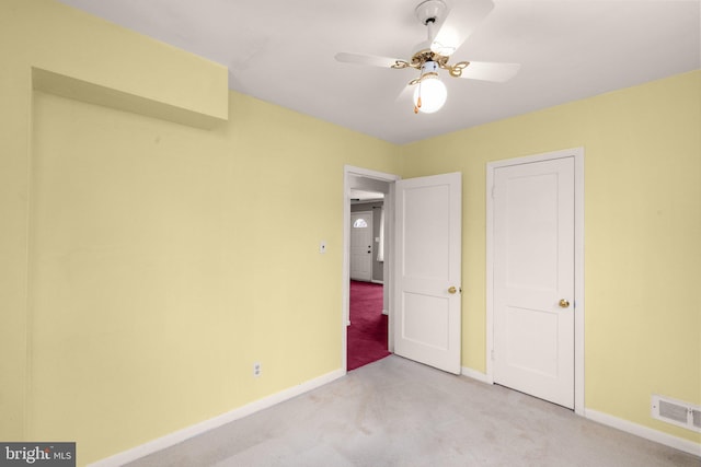 2216 Gaylawn Dr, Halethorpe, MD 21227 - unfurnished bedroom featuring light carpet and a ceiling fan