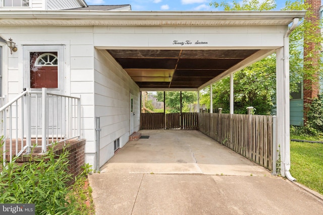 2216 Gaylawn Dr, Halethorpe, MD 21227 - view of car parking with driveway and a carport