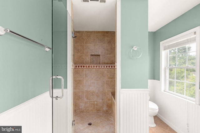 2216 Gaylawn Dr, Halethorpe, MD 21227 - full bath with a wainscoted wall, a stall shower, and tile patterned flooring