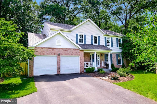 12513 Dardanelle Ct, Herndon, VA 20170 - view of front of home featuring a porch, driveway, brick siding, a garage, and a front lawn