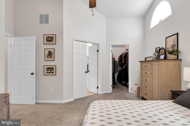 12513 Dardanelle Ct, Herndon, VA 20170 - carpeted bedroom featuring a walk in closet, a high ceiling, and a closet