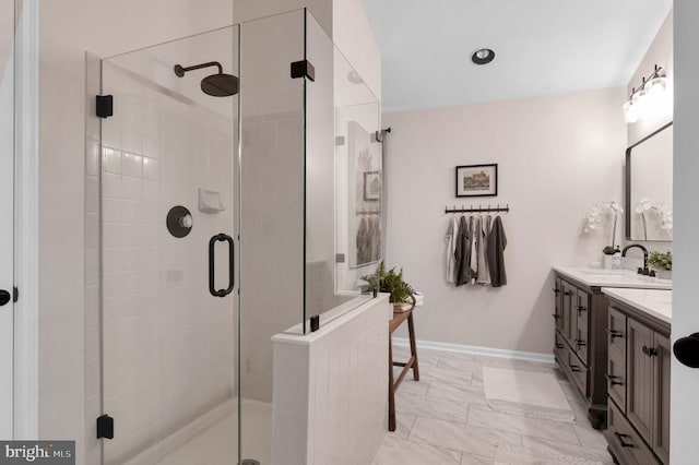 12513 Dardanelle Ct, Herndon, VA 20170 - bathroom featuring a shower stall, vanity, and marble look tile flooring