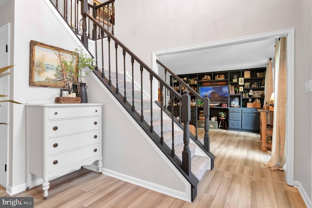 12513 Dardanelle Ct, Herndon, VA 20170 - stairs with wood finished floors and baseboards