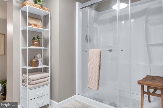 12513 Dardanelle Ct, Herndon, VA 20170 - full bath featuring a stall shower and marble look tile flooring