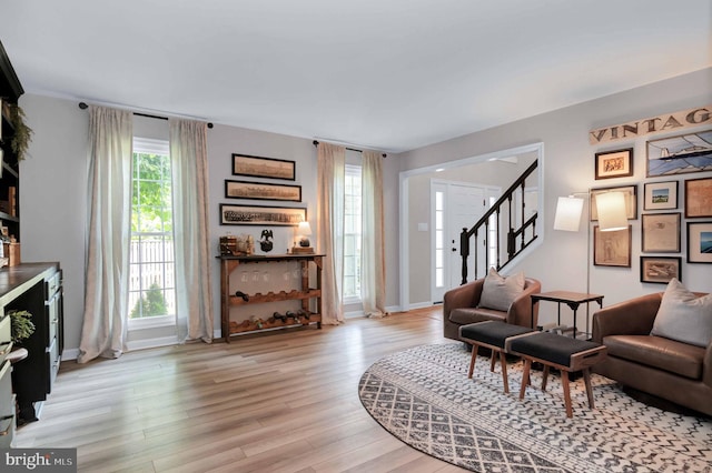 12513 Dardanelle Ct, Herndon, VA 20170 - living area with light wood-type flooring and stairway