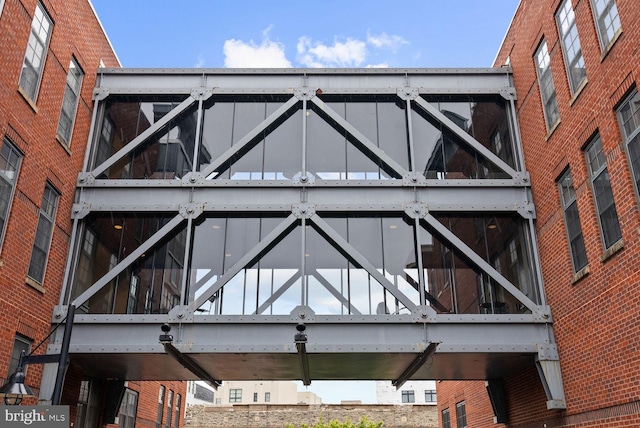 2328 Champlain St NW Unit 101, Washington, DC 20009 - view of side of property with brick siding and a sunroom