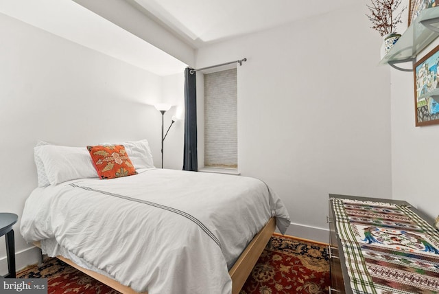 2328 Champlain St NW Unit 101, Washington, DC 20009 - bedroom featuring baseboards and wood finished floors