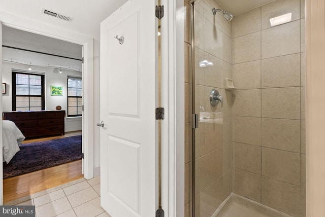 2328 Champlain St NW Unit 101, Washington, DC 20009 - ensuite bathroom with a shower stall and tile patterned flooring