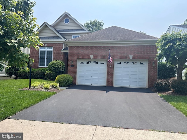 15209 Brier Creek Dr, Haymarket, VA 20169 - traditional-style home with a garage, asphalt driveway, brick siding, and a front yard