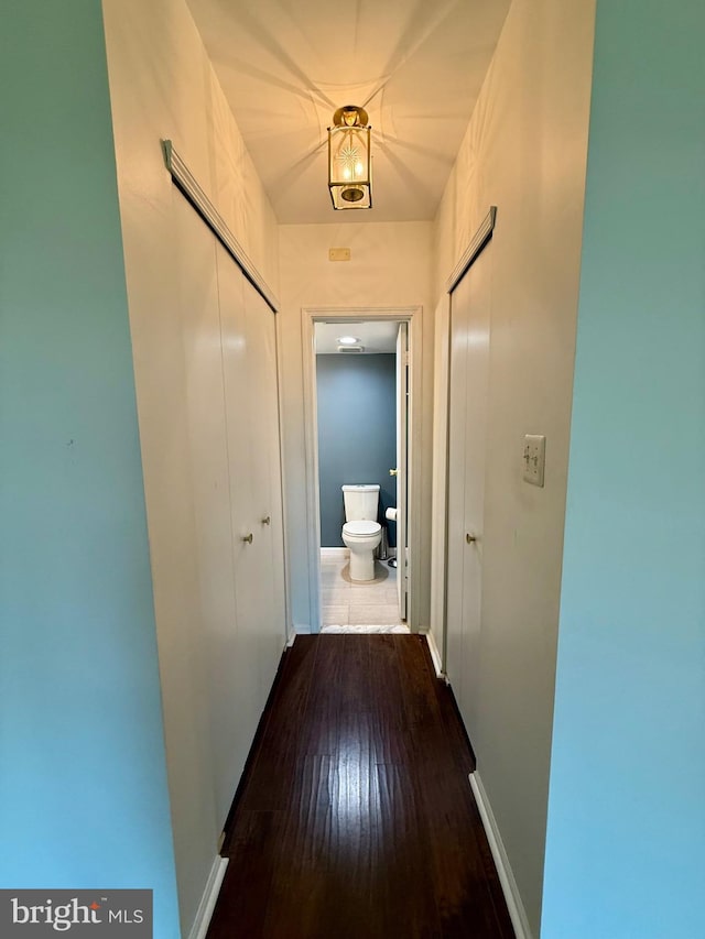 301 Byberry Rd Unit H10, Philadelphia, PA 19116 - hall featuring dark wood-type flooring and baseboards