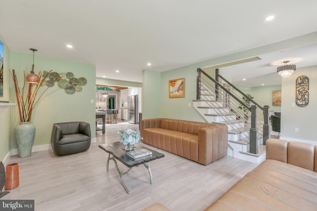 11726 Lariat Ln, Oakton, VA 22124 - living area with wood finished floors, stairway, and recessed lighting