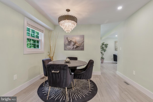 11726 Lariat Ln, Oakton, VA 22124 - dining area with a chandelier, wood finished floors, and recessed lighting