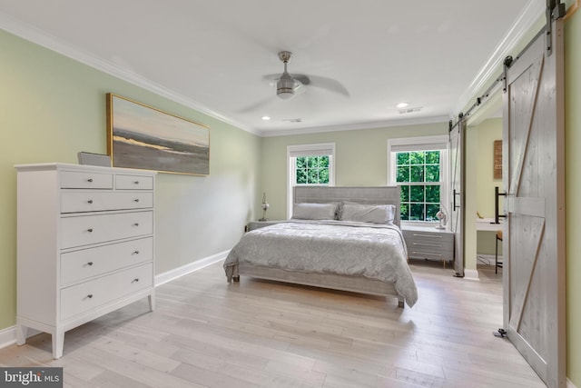 11726 Lariat Ln, Oakton, VA 22124 - bedroom featuring a barn door, ornamental molding, light wood-type flooring, recessed lighting, and ceiling fan