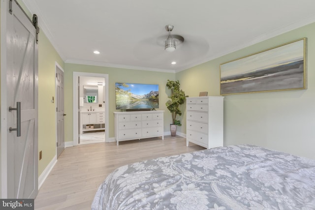 11726 Lariat Ln, Oakton, VA 22124 - bedroom with a barn door, light wood-style floors, ornamental molding, recessed lighting, and ensuite bath