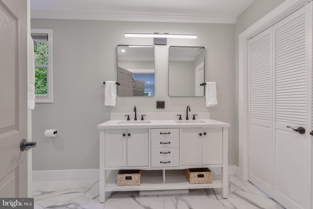 11726 Lariat Ln, Oakton, VA 22124 - bathroom with a closet, marble look tiles, double vanity, and crown molding