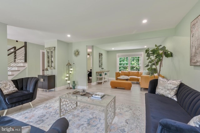 11726 Lariat Ln, Oakton, VA 22124 - living area with wood finished floors, stairway, and recessed lighting
