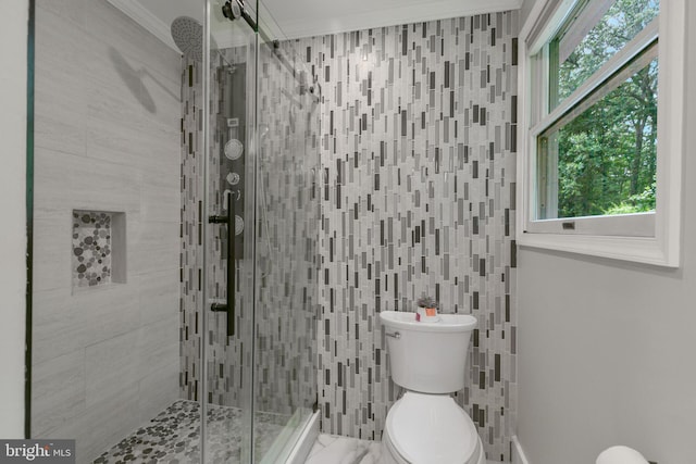 11726 Lariat Ln, Oakton, VA 22124 - full bathroom featuring a stall shower, tile walls, and ornamental molding