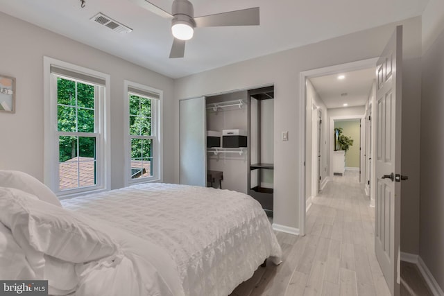 11726 Lariat Ln, Oakton, VA 22124 - bedroom featuring light wood-type flooring, a closet, a ceiling fan, and recessed lighting