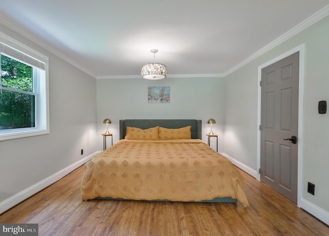 11726 Lariat Ln, Oakton, VA 22124 - bedroom with wood finished floors and ornamental molding