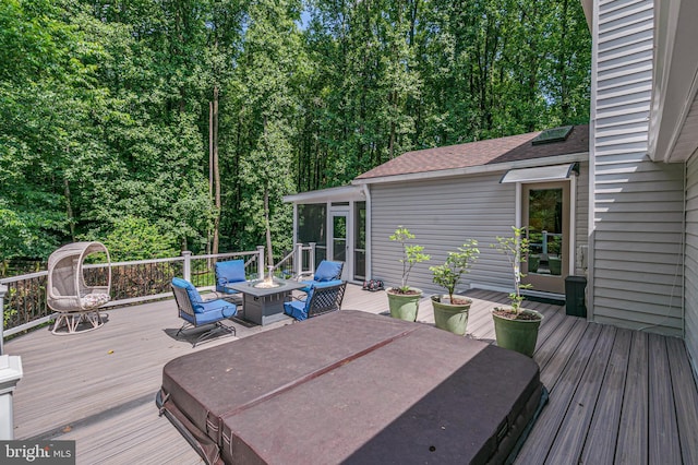 11726 Lariat Ln, Oakton, VA 22124 - wooden deck with a sunroom and a fire pit