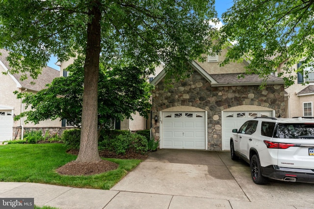 14 Mcconkey Dr, Washington Crossing, PA 18977 - view of property hidden behind natural elements with stone siding, concrete driveway, and a front lawn
