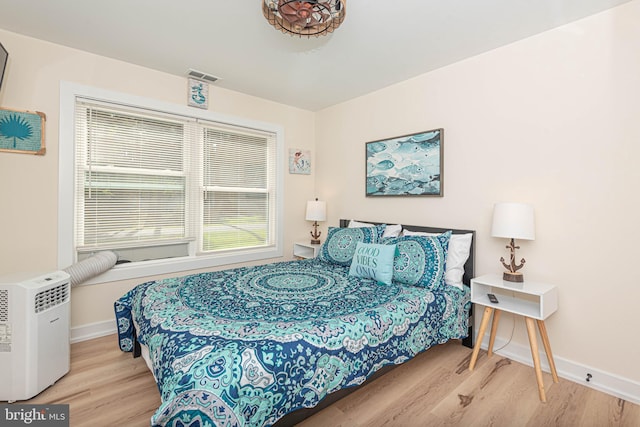 120 Robin Hood, Ocean Pines, MD 21811 - bedroom featuring wood finished floors and multiple windows