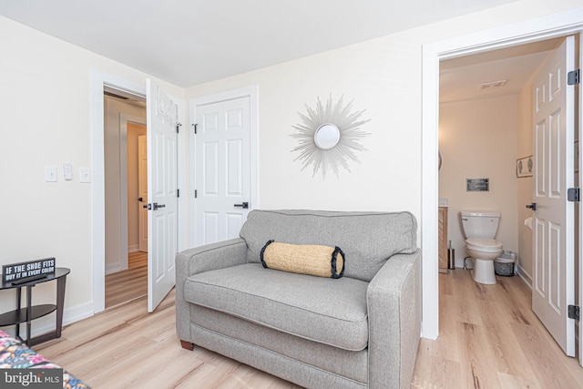 120 Robin Hood, Ocean Pines, MD 21811 - living area featuring light wood-style flooring and baseboards
