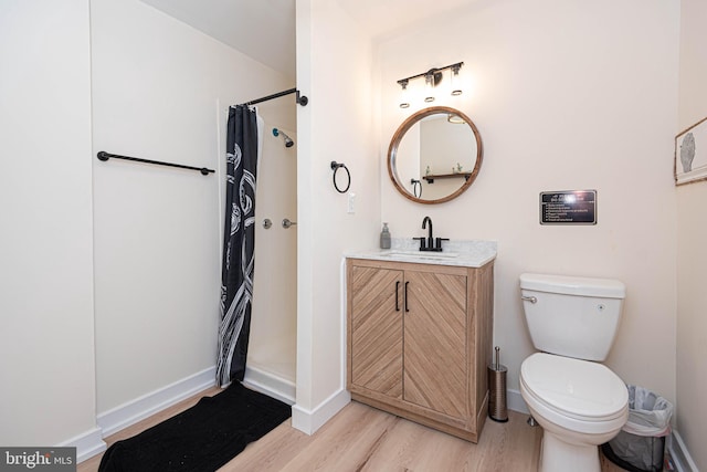 120 Robin Hood, Ocean Pines, MD 21811 - full bathroom featuring wood finished floors, vanity, and a shower with curtain