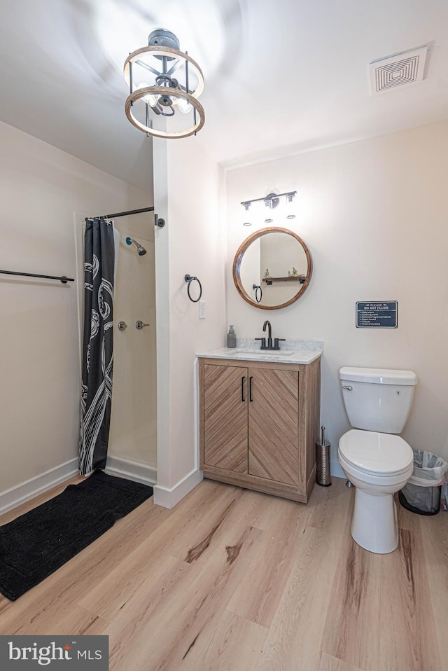 120 Robin Hood, Ocean Pines, MD 21811 - full bathroom featuring wood finished floors, vanity, and a shower with shower curtain