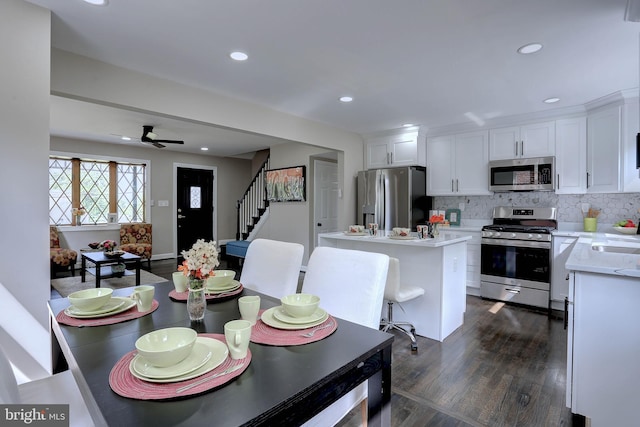 1204 Krueger Ave, Rosedale, MD 21237 - dining space featuring dark wood-type flooring, stairway, recessed lighting, and a ceiling fan