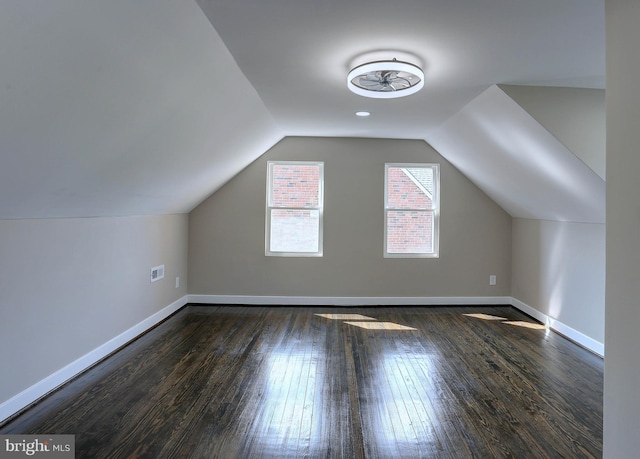 1204 Krueger Ave, Rosedale, MD 21237 - additional living space with dark wood finished floors and vaulted ceiling