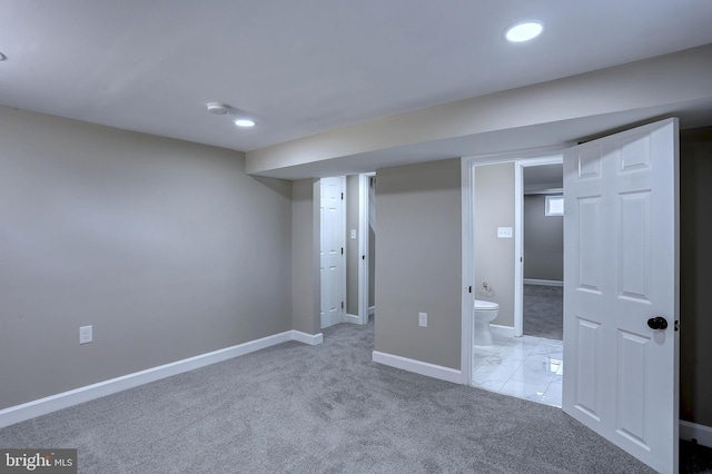 1204 Krueger Ave, Rosedale, MD 21237 - finished below grade area featuring light carpet and recessed lighting