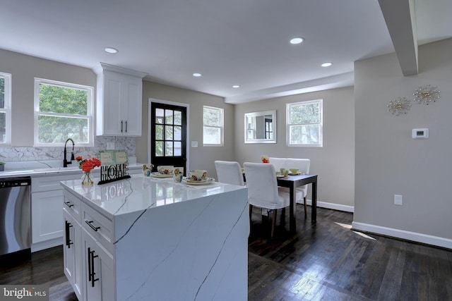 1204 Krueger Ave, Rosedale, MD 21237 - kitchen with dishwasher, healthy amount of natural light, light stone countertops, dark wood-style flooring, and recessed lighting