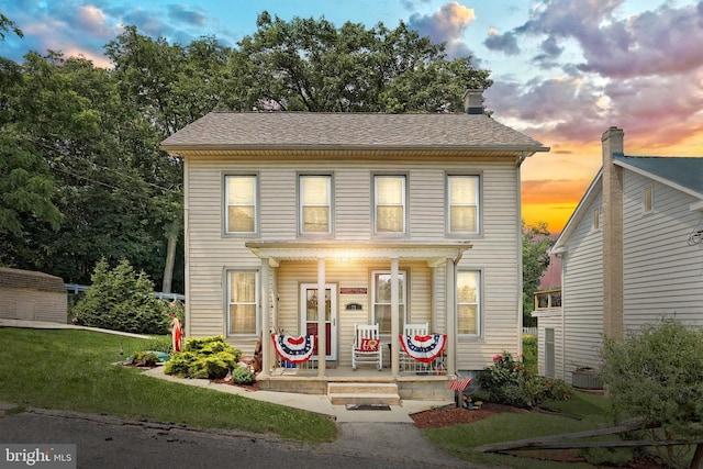 75 Railroad Ave, York Haven, PA 17370 - view of front of property featuring a porch and a front yard
