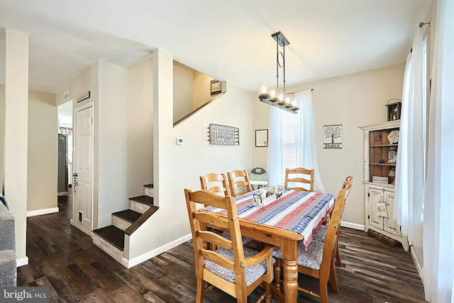 75 Railroad Ave, York Haven, PA 17370 - dining area with stairs, dark wood finished floors, and a chandelier
