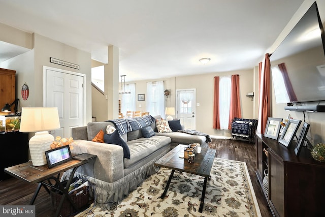 75 Railroad Ave, York Haven, PA 17370 - living room with dark wood-style flooring, a chandelier, and stairs
