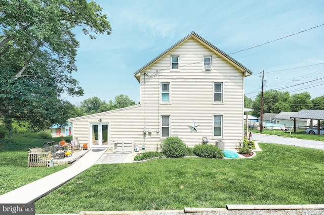 75 Railroad Ave, York Haven, PA 17370 - back of house with a lawn, french doors, and a patio