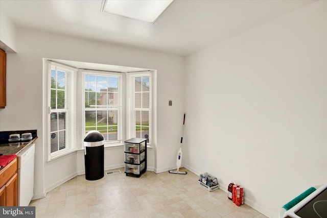 37 Joyceton Way, Upper Marlboro, MD 20774 - kitchen featuring white dishwasher and brown cabinetry