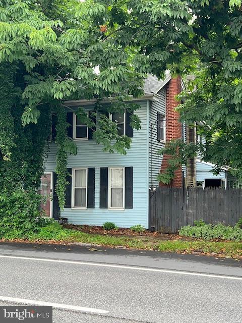 6598 Carlisle Pike, Mechanicsburg, PA 17050 - view of side of home with a chimney