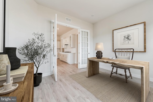 15429 Solomon Way, Lewes, DE 19958 - home office with french doors and light wood-type flooring