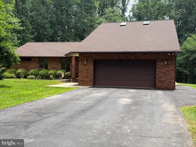 3 Ridgecliff Ct, Kingsville, MD 21087 - view of front of property with brick siding, asphalt driveway, a front lawn, roof with shingles, and an attached garage